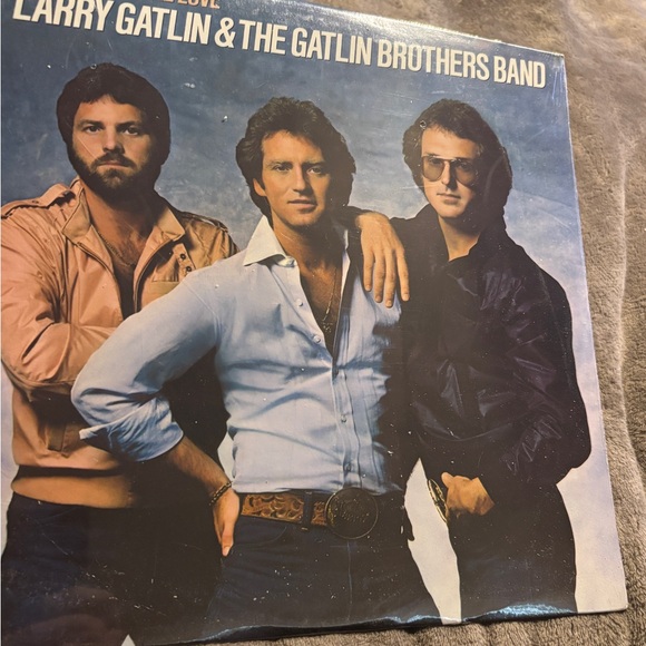 Larry Gatlin & The Gatlin Brothers Band Sure Feels like Love Vinyl Record 1982 - Picture 1 of 3